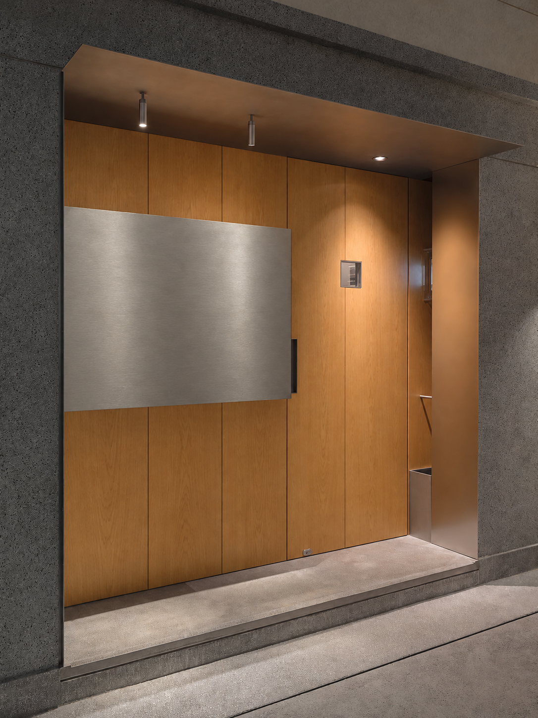 Natural wood wall panels within a stone-framed architectural entrance